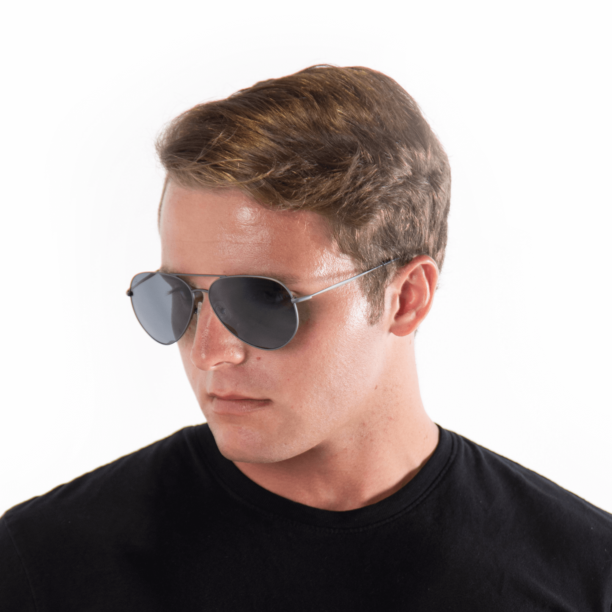 A male model wearing Bodacious Blackberry sunglasses, size large-XL.