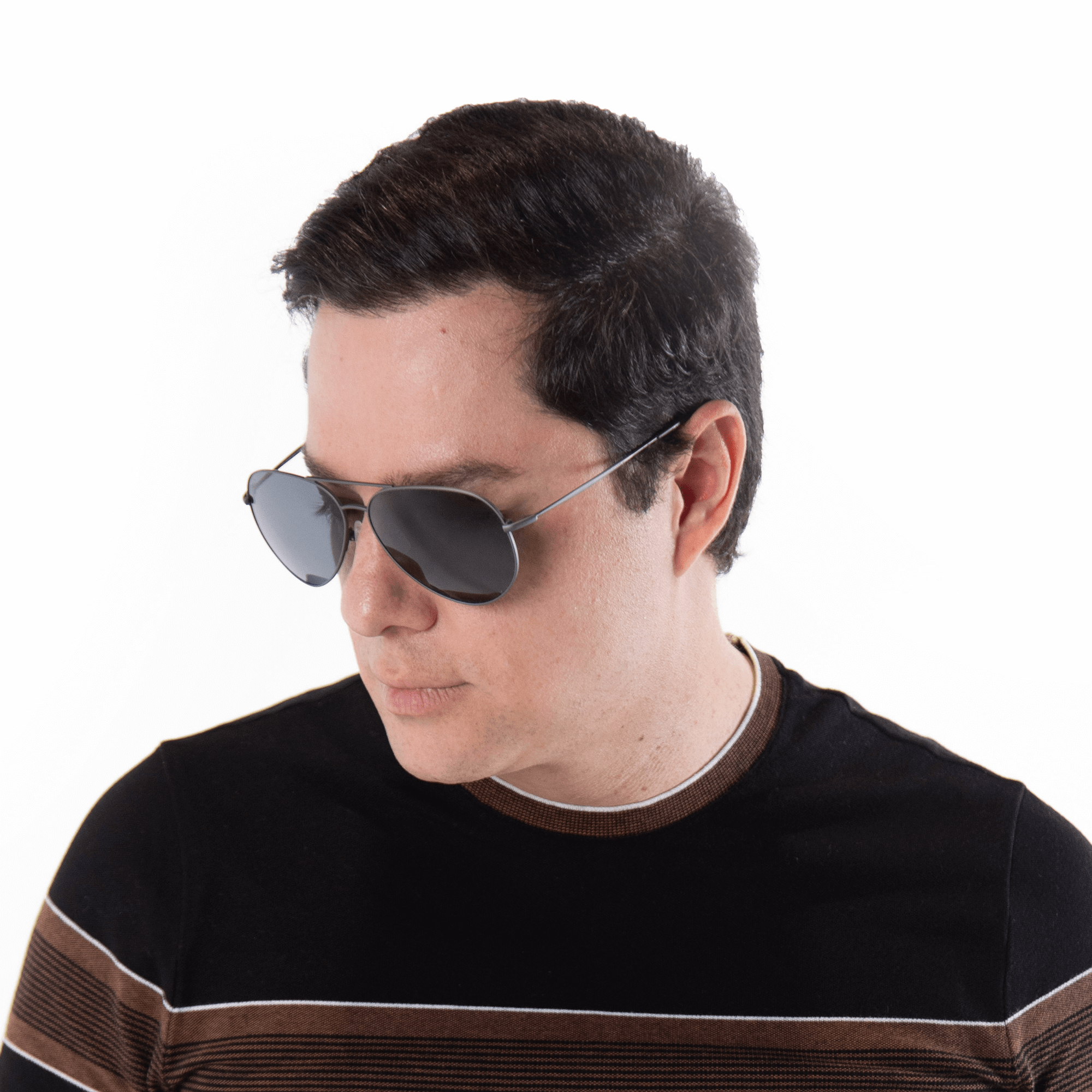 A male model wearing Bodacious Blackberry sunglasses, size medium.