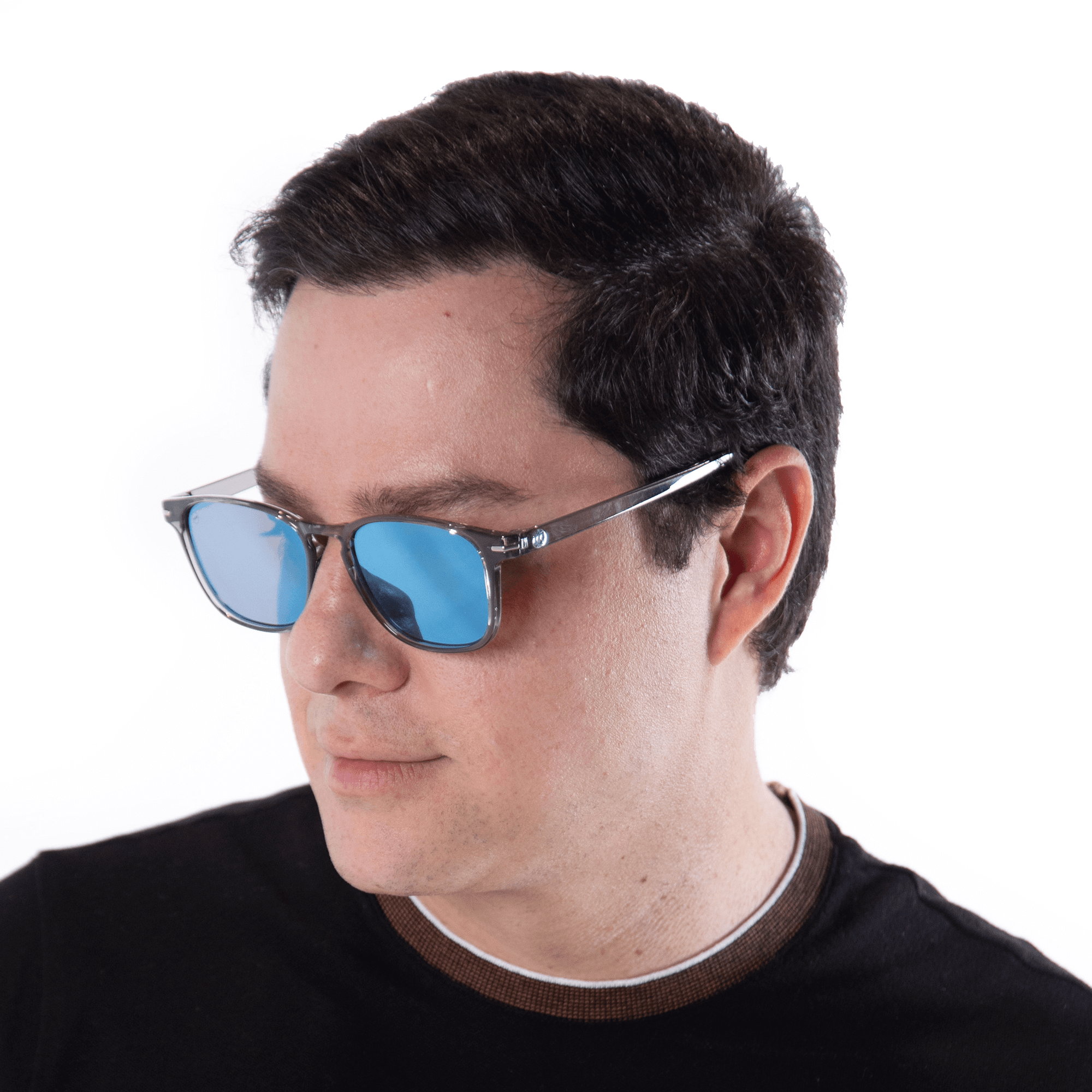 A male model wearing Honeydew Blueberry sunglasses, size large-XL.