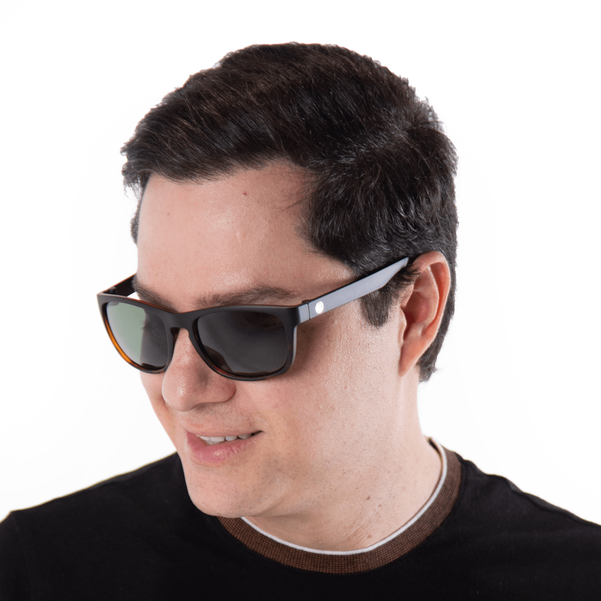 A male model wearing Sugar Kiwi sunglasses, size medium.