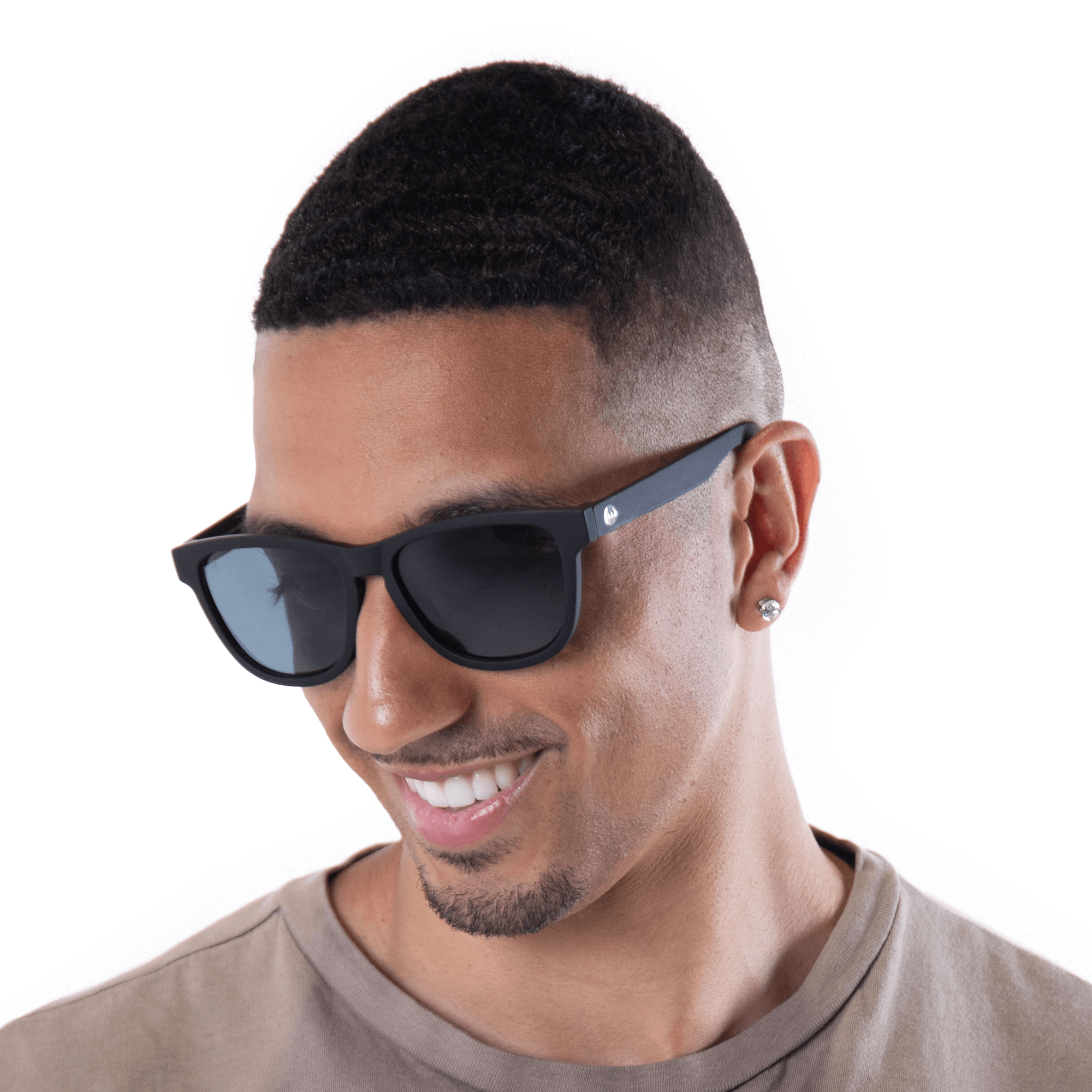 A male model wearing Valencia Blackberry sunglasses, size medium.