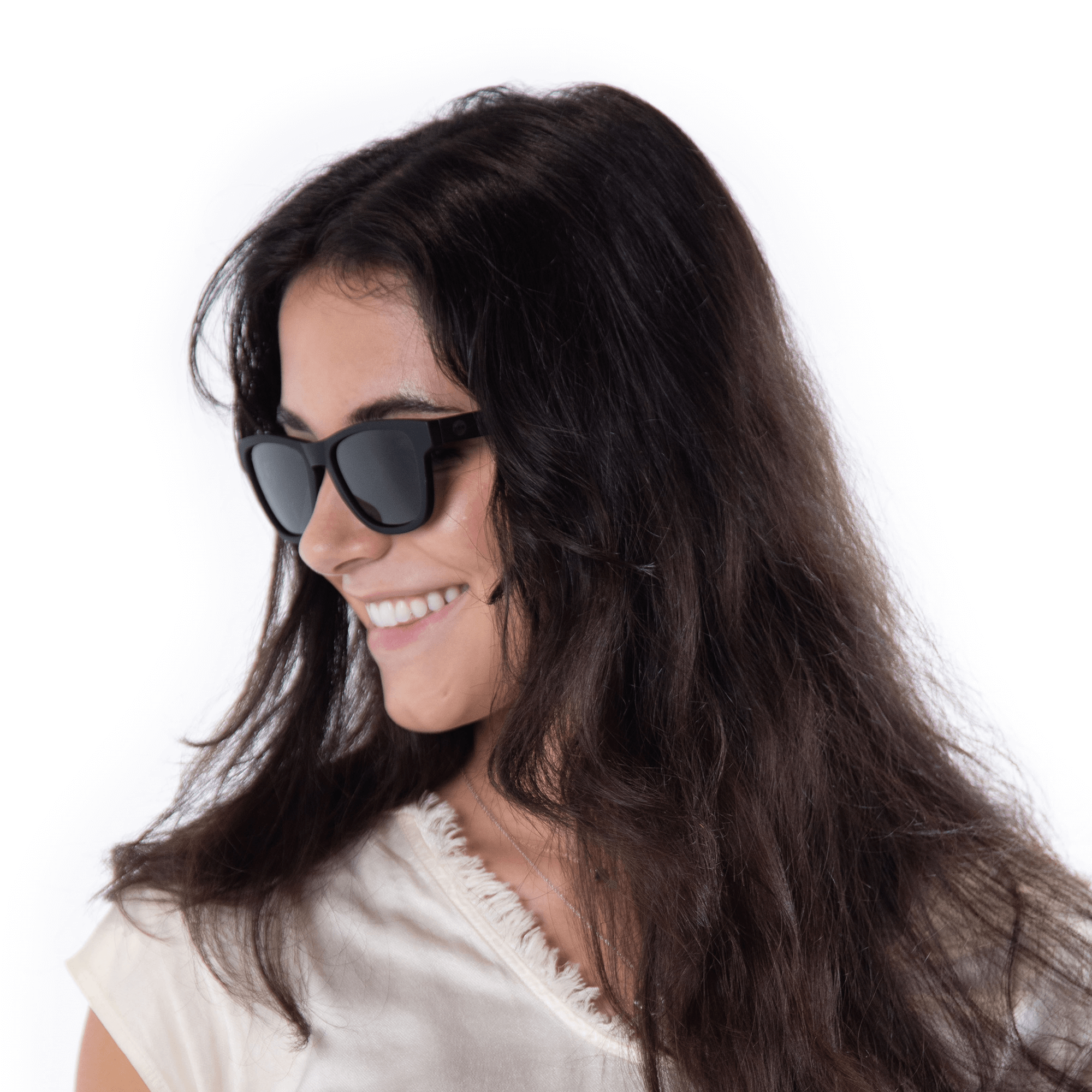 A female model wearing Valencia Blackberry sunglasses, size small.