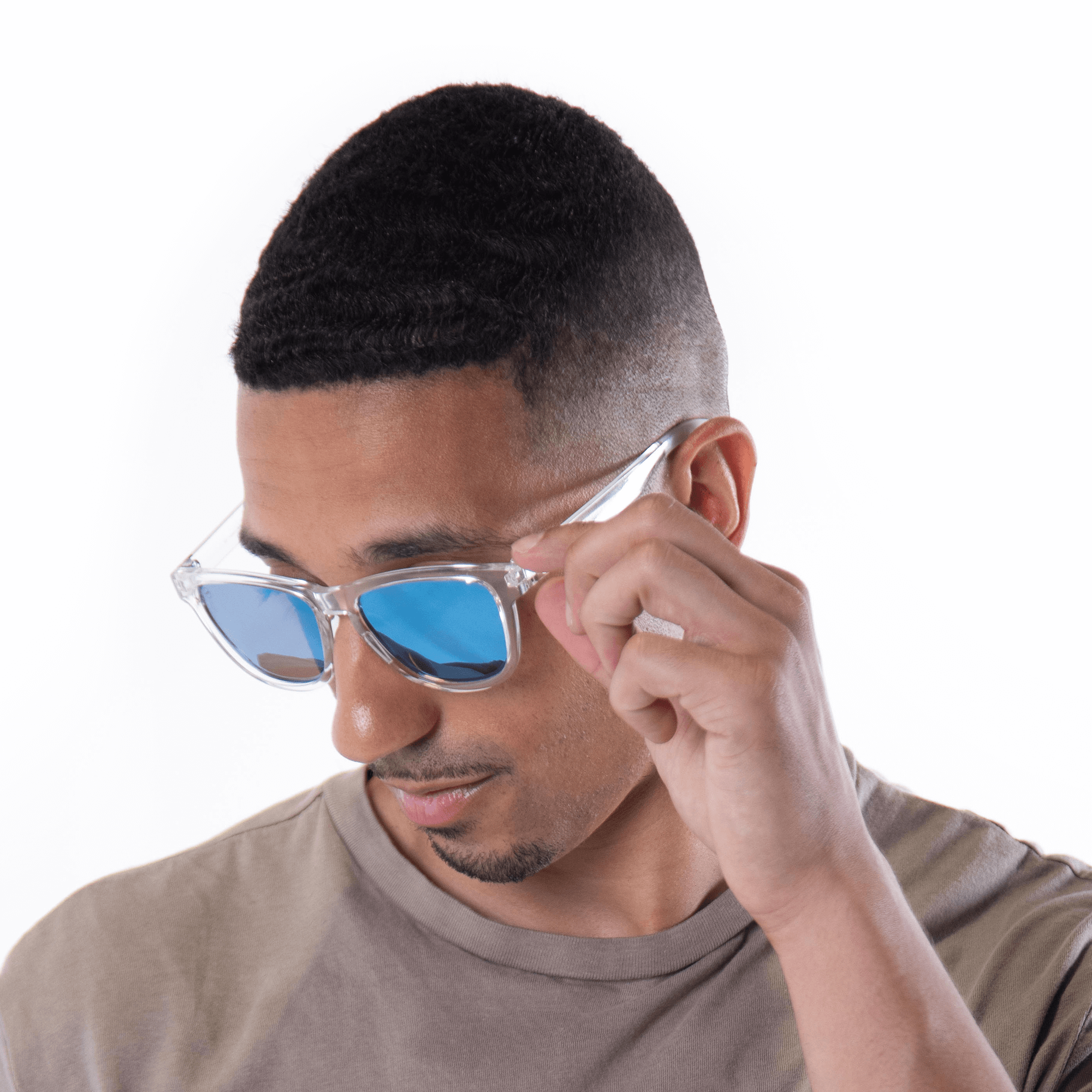 A male model wearing Valencia Ice sunglasses, size medium.